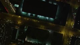 5K aerial stock footage Bird's eye view of city streets and buildings in Downtown Oakland, California, night Aerial Stock Footage | AXSF07_093