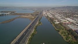 5K aerial stock footage of flying over Interstate 80 freeway and Aquatic Park, Berkeley, California Aerial Stock Footage | AXSF08_002