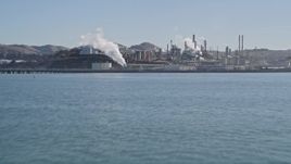 5K aerial stock footage of flying over San Pablo Bay, reveal ConocoPhillips Oil Refinery, Rodeo, California Aerial Stock Footage | AXSF08_021
