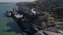 5K aerial stock footage approach and fly past the C&H Pure Cane Sugar Factory, Crockett, California Aerial Stock Footage | AXSF08_030