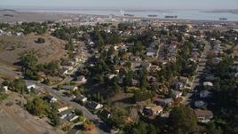 5K aerial stock footage fly over suburban tract homes, reveal Valero Oil Refinery, Benicia, California Aerial Stock Footage | AXSF08_031