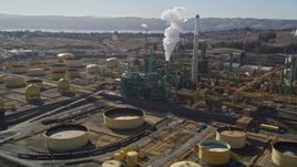 5K aerial stock footage of flying by Valero Oil Refinery buildings, Benicia, California Aerial Stock Footage | AXSF08_035