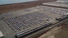 5K aerial stock footage of cars at the Valero Oil Refinery parking lot, Benicia, California Aerial Stock Footage | AXSF08_036