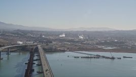 5K aerial stock footage pan from the Benicia-Martinez Bridge to the Shell Oil Refinery, California Aerial Stock Footage | AXSF08_046