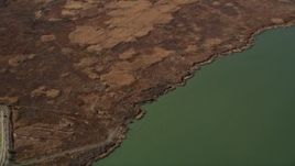 5K aerial stock footage of flying away from Belloma Slough, Suisun Bay, California Aerial Stock Footage | AXSF08_062