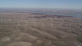 5K aerial stock footage of flying by field of windmills, Shiloh Wind Power Plant, Montezuma Hills, California Aerial Stock Footage | AXSF08_080