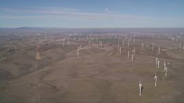 5K aerial stock footage of hilly field of windmills, Shiloh Wind Power Plant, Montezuma Hills, California Aerial Stock Footage | AXSF08_081