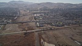 5K aerial stock footage of approaching a train passing suburban houses, Pittsburg, California Aerial Stock Footage | AXSF08_085