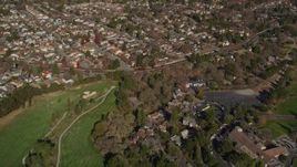 5K aerial stock footage fly away from suburban houses, Contra Costa Golf Club, Pleasant Hill, California Aerial Stock Footage | AXSF09_002