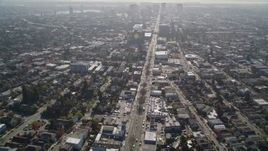 5K aerial stock footage of panning across urban neighborhoods to reveal Broadway, Oakland, California Aerial Stock Footage | AXSF09_015