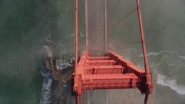 5K aerial stock footage of bird's eye view of light traffic on the Golden Gate Bridge, San Francisco, California Aerial Stock Footage | AXSF09_032