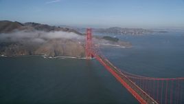 5K aerial stock footage of flying by the world famous Golden Gate Bridge with light fog, San Francisco, California Aerial Stock Footage | AXSF09_041