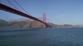 5K aerial stock footage of flying low over the Bay near the world famous Golden Gate Bridge, San Francisco, California Aerial Stock Footage | AXSF09_043