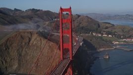 5K aerial stock footage approach and pass by a tower on the Marin side of the Golden Gate Bridge, San Francisco, California Aerial Stock Footage | AXSF09_050