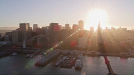 5K aerial stock footage reverse view of the Financial District skyline, San Francisco, California, sunset Aerial Stock Footage | AXSF10_008