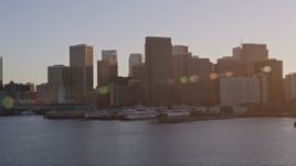 5K aerial stock footage of waterfront skyscrapers and Ferry Building in Downtown San Francisco, California at sunset Aerial Stock Footage | AXSF10_013