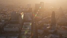 5K aerial stock footage of flying over Market Street through Civic Center, Downtown San Francisco, California at sunset Aerial Stock Footage | AXSF10_017