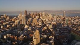 5K aerial stock footage of flying by city buildings and Market Street, Downtown San Francisco, California, sunset Aerial Stock Footage | AXSF10_019