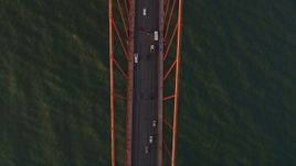 5K aerial stock footage bird's eye view of traffic on the Golden Gate Bridge, San Francisco, California, sunset Aerial Stock Footage | AXSF10_039