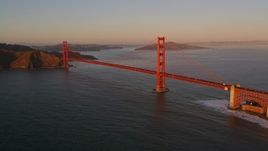 5K aerial stock footage flying away from the Golden Gate Bridge, San Francisco, California, sunset Aerial Stock Footage | AXSF10_043