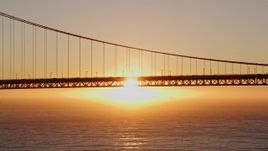 5K aerial stock footage flying by the center of the Golden Gate Bridge, San Francisco, California, sunset Aerial Stock Footage | AXSF10_049