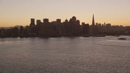 5K aerial stock footage of the Ferry Building and Downtown San Francisco skyline, California, sunset Aerial Stock Footage | AXSF10_067