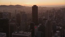 5K aerial stock footage fly over downtown past 555 California Street skyscraper for view of Mount Sutro, Downtown San Francisco, California, twilight Aerial Stock Footage | AXSF10_070