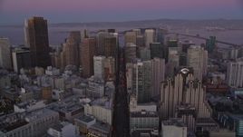 5K aerial stock footage tilt from Market Street to reveal and approach Downtown San Francisco, California, twilight Aerial Stock Footage | AXSF10_076