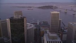 5K aerial stock footage follow Market Street to approach and tilt to Ferry Building, Downtown San Francisco, California, twilight Aerial Stock Footage | AXSF10_078