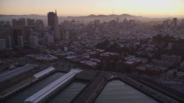 5K aerial stock footage pan across San Francisco Bay to reveal Coit Tower, Fisherman's Wharf, and downtown, California, sunset Aerial Stock Footage | AXSF10_079