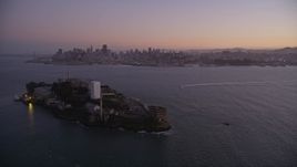 5K aerial stock footage of flying away from downtown, revealing Alcatraz, Downtown San Francisco, California, twilight Aerial Stock Footage | AXSF10_082