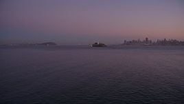 5K aerial stock footage pan across San Francisco Bay, reveal Alcatraz and Downtown San Francisco skyline, California, twilight Aerial Stock Footage | AXSF10_084