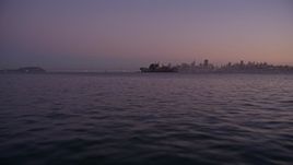 5K aerial stock footage low altitude approach to Alcatraz, San Francisco, California, twilight Aerial Stock Footage | AXSF10_085