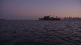 5K aerial stock footage of approaching Alcatraz at a low altitude, San Francisco, California, twilight Aerial Stock Footage | AXSF10_086