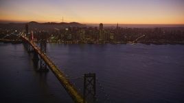 5K aerial stock footage of the Bay Bridge and the Downtown San Francisco skyline, California, twilight Aerial Stock Footage | AXSF10_106