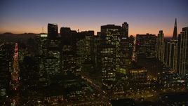 5K aerial stock footage of passing skyscrapers in Downtown San Francisco, California, twilight Aerial Stock Footage | AXSF10_112