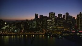 5K aerial stock footage flyby the skyline of Downtown San Francisco, reveal Ferry Building, California, twilight Aerial Stock Footage | AXSF10_113