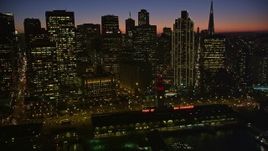5K aerial stock footage fly by downtown skyline and reveal Ferry Building, Downtown San Francisco, California, twilight Aerial Stock Footage | AXSF10_117