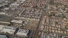 5K aerial stock footage reverse view of tract homes, reveal office buildings, Hayward, California Aerial Stock Footage | AXSF11_004