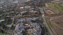 5K aerial stock footage tilt up to reveal Googleplex, tilt down on three office buildings, Mountain View, California Aerial Stock Footage | AXSF11_044