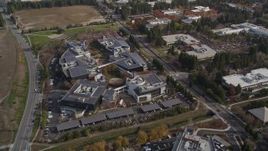 5K aerial stock footage of tilting to reveal office complexes, tilt to bird's eye of Googleplex buildings, Mountain View, California Aerial Stock Footage | AXSF11_047