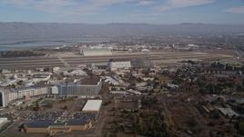 5K aerial stock footage approach Moffett Field, Hangar One, NASA Ames Research Center, Mountain View, California Aerial Stock Footage | AXSF11_050