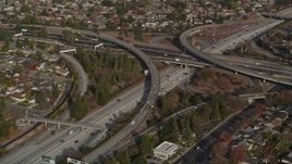 5K aerial stock footage of flying by Highway 87/Interstate 280 freeway interchange, Downtown San Jose, California Aerial Stock Footage | AXSF12_019