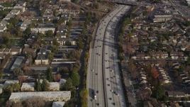 5K aerial stock footage of a reverse view of I-280 freeway with light traffic, San Jose, California Aerial Stock Footage | AXSF12_023