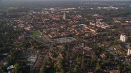 5K aerial stock footage tilt from apartment buildings to reveal and approach Hoover Tower and Stanford University, Stanford, California Aerial Stock Footage | AXSF12_039