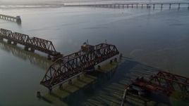 5K aerial stock footage of flying by a railroad bridge, Dumbarton Bridge, San Francisco Bay, California Aerial Stock Footage | AXSF12_067