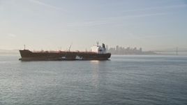 5K aerial stock footage flyby oil tanker to reveal second tanker on San Francisco Bay, San Francisco, California Aerial Stock Footage | AXSF13_002