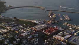 5K aerial stock footage of flying over historic ships at Hyde Street Pier, Russian Hill, reveal Fort Mason, San Francisco, California Aerial Stock Footage | AXSF13_022