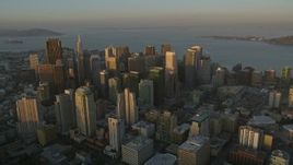 5K aerial stock footage flying by skyscrapers in Downtown San Francisco, California, twilight Aerial Stock Footage | AXSF14_003