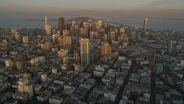 5K aerial stock footage of approaching city skyscrapers from Civic Center, Downtown San Francisco, California, sunset Aerial Stock Footage | AXSF14_006